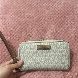 Michael Kors Beige Signature Logo Wristlet with Gold Plate